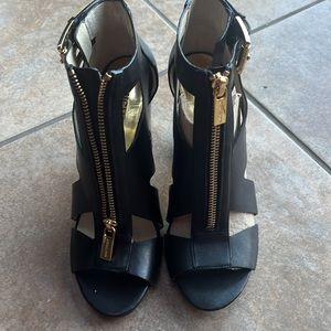Michael Kors 6.5 pre owned. Wore a couple of times